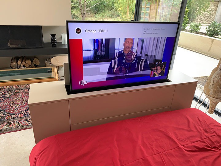 Escamotage TV dans un meuble